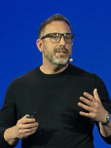 Jonathan Cordeau speaking on stage